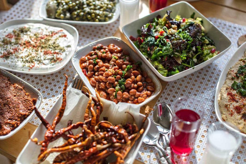 a table with a selection of traditional Turkish meze dishes