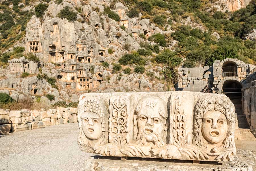 Ancient Lycian city of Myra rock tomb ruins in Demre, Antalya